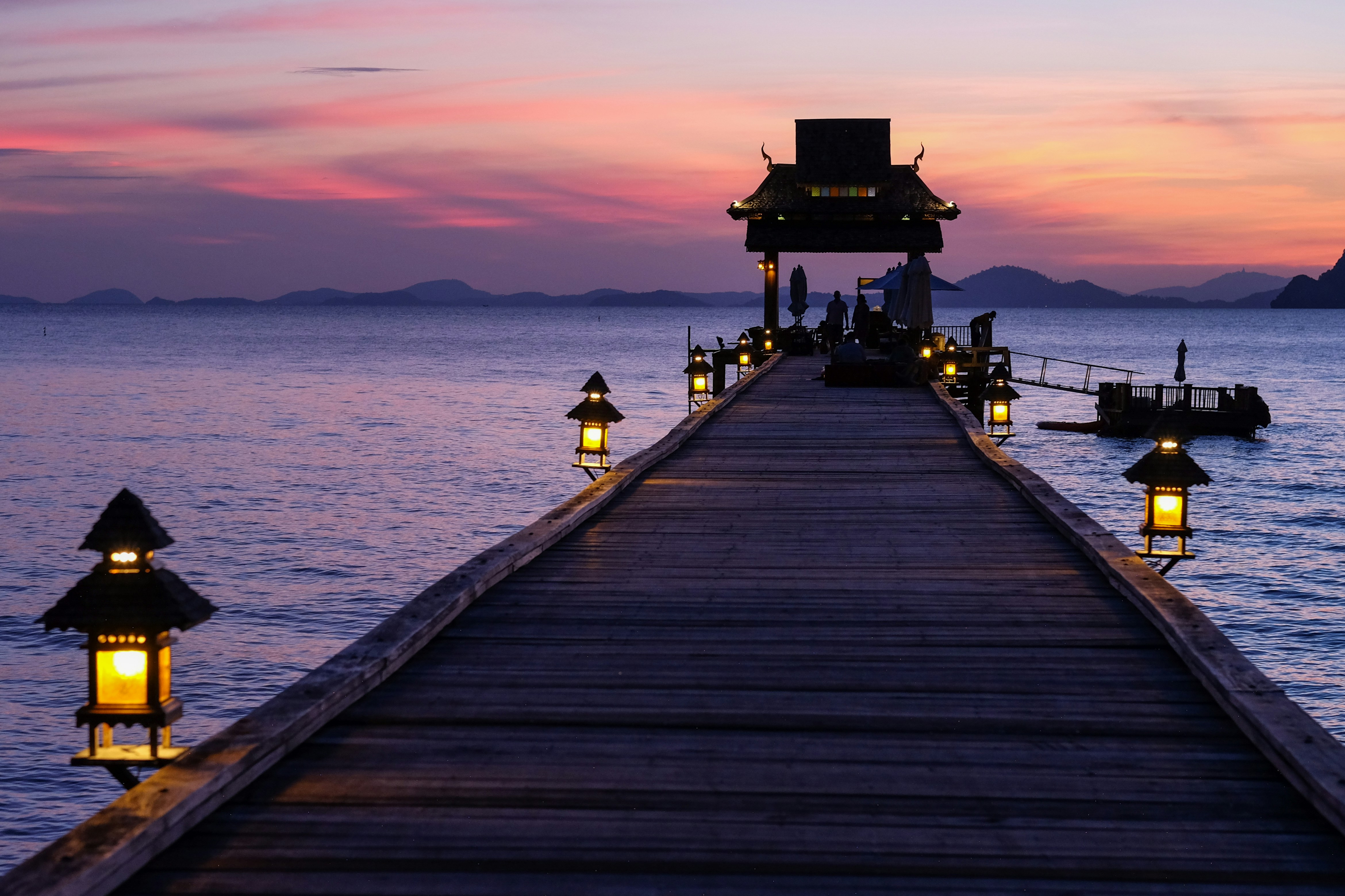 Background image of a map and travel items for planning a trip in Thailand